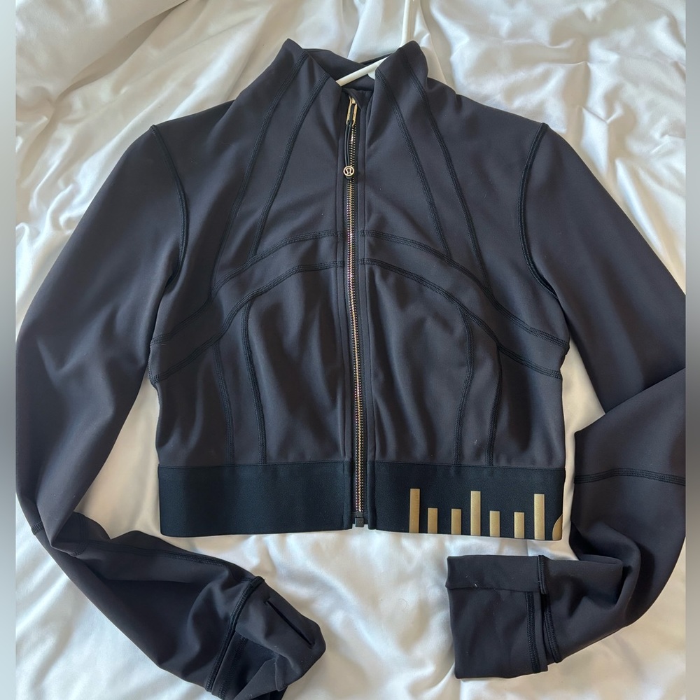 Lululemon cropped jacket with gold accents